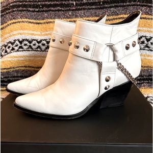 Worn once. Needed a bigger size due to the toe being smaller than expected.